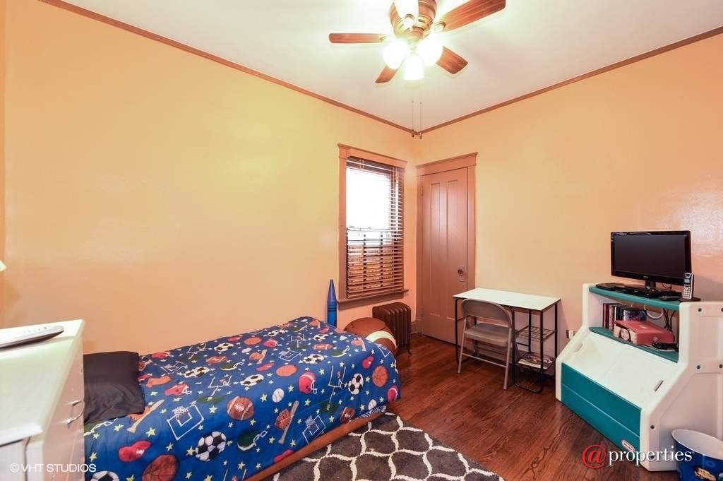 7828 S Eberhart Avenue Chicago, Illinois 60619 - Bedroom
