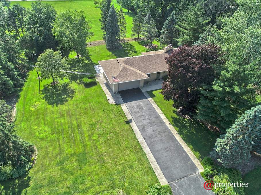 1255 Benson Lane Green Oaks, Illinois 60048 - Positioned amongst mature trees